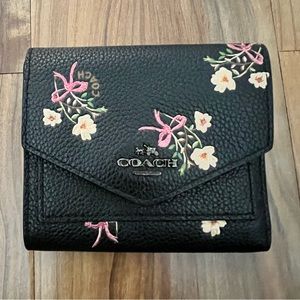 Coach floral pleather bill fold wallet